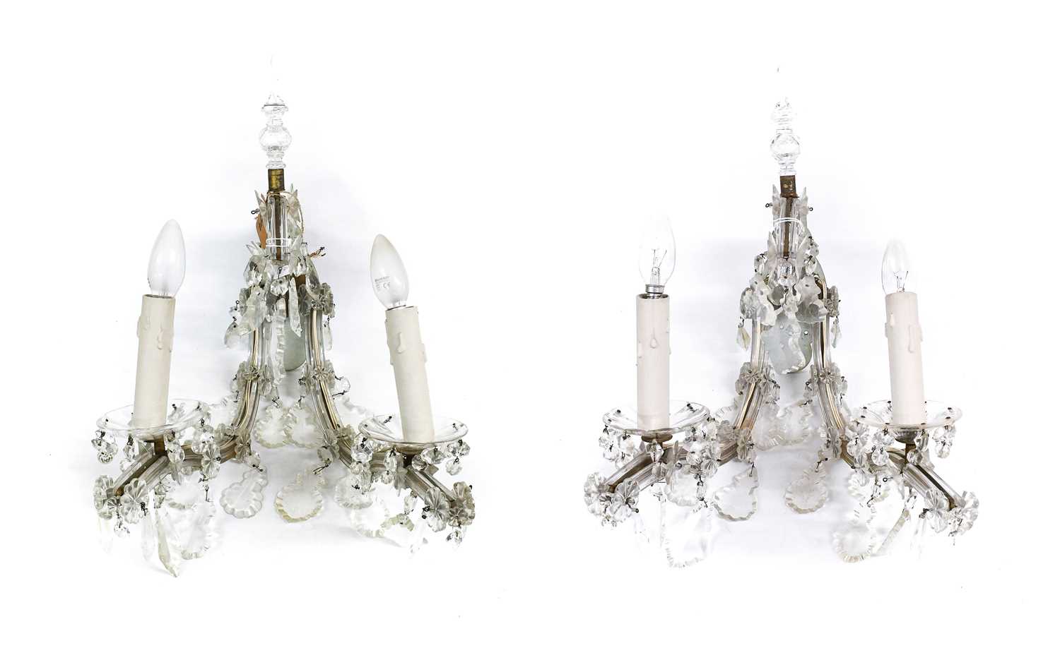A Pair of Cut Glass Twin-Light Wall Sconces, late 19th century, with mineret finials and scroll