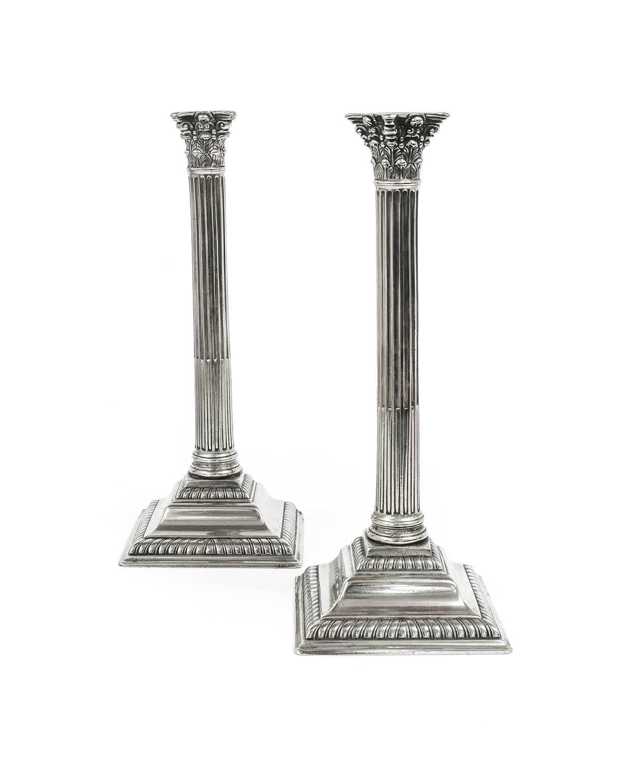 A Pair of George III Paktong Corinthian Column Candlesticks, with leaf-sheathed capitals, stop-