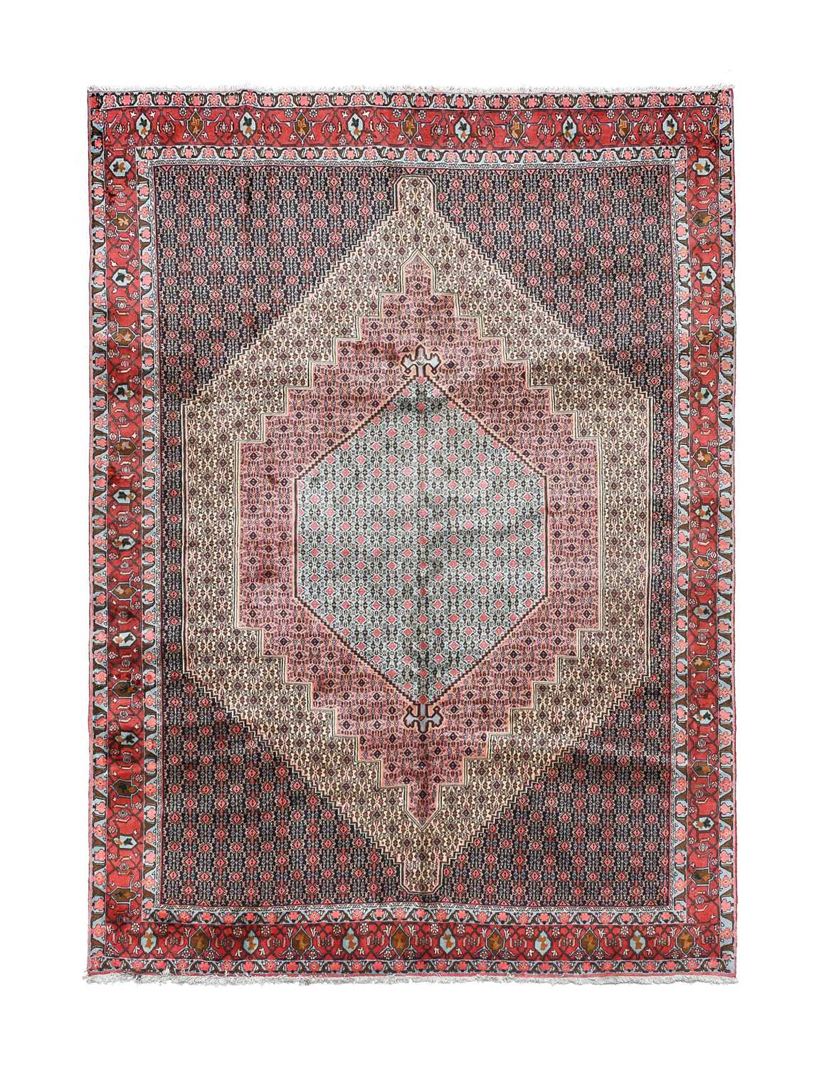 Bidjar Carpet Iranian Kurdistan, circa 1970 The field comprising sky blue and candy pink lozenges