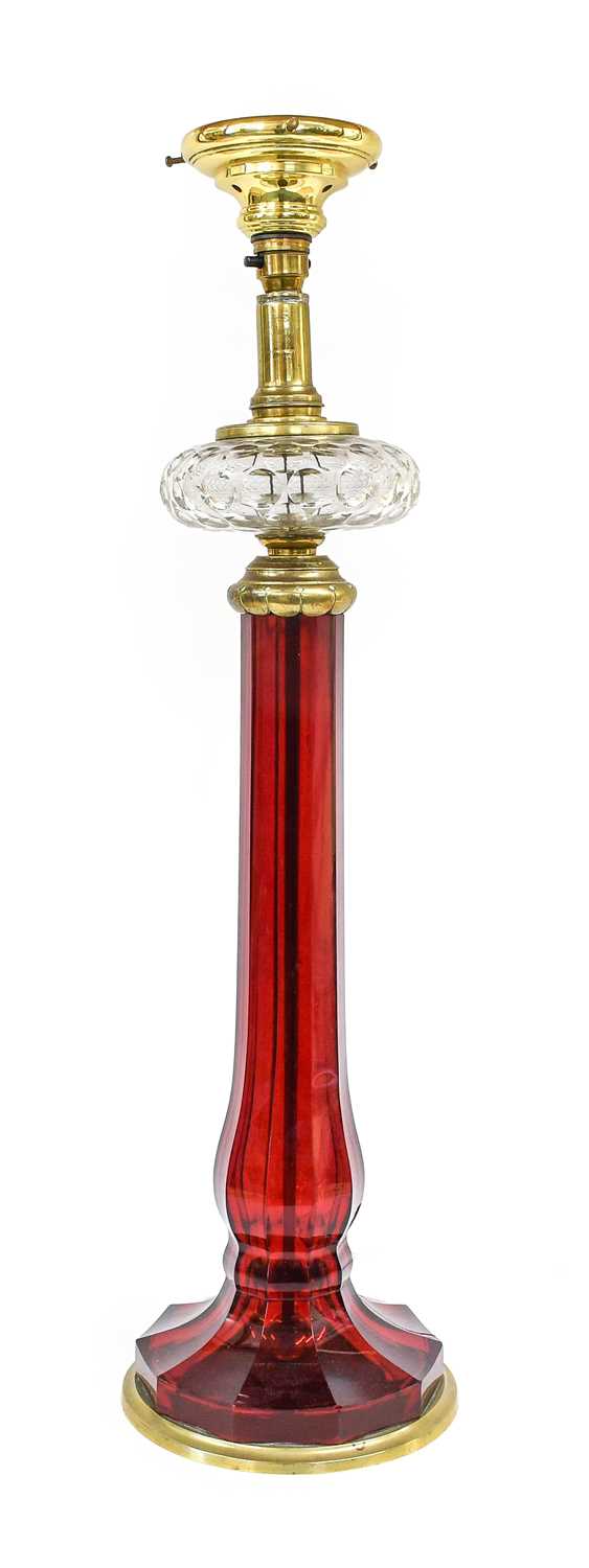 A Gilt-Metal-Mounted Ruby Glass Lamp Base, late 19th/early 20th century, of panelled slender