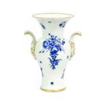 A Worcester Porcelain Vase, circa 1770, of baluster form and with rococo scroll handles, edged in