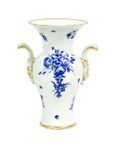 A Worcester Porcelain Vase, circa 1770, of baluster form and with rococo scroll handles, edged in