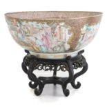 A Chinese Porcelain Punch Bowl, Qianlong, decorated in the Mandarin palette with figures at
