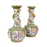 A Pair of Cantonese Porcelain Vases, 19th century, with compressed globular bodies and slender necks