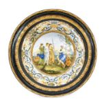 An Italian Maiolica Charger, 17th century style, possibly Castelli, painted with Classical figures