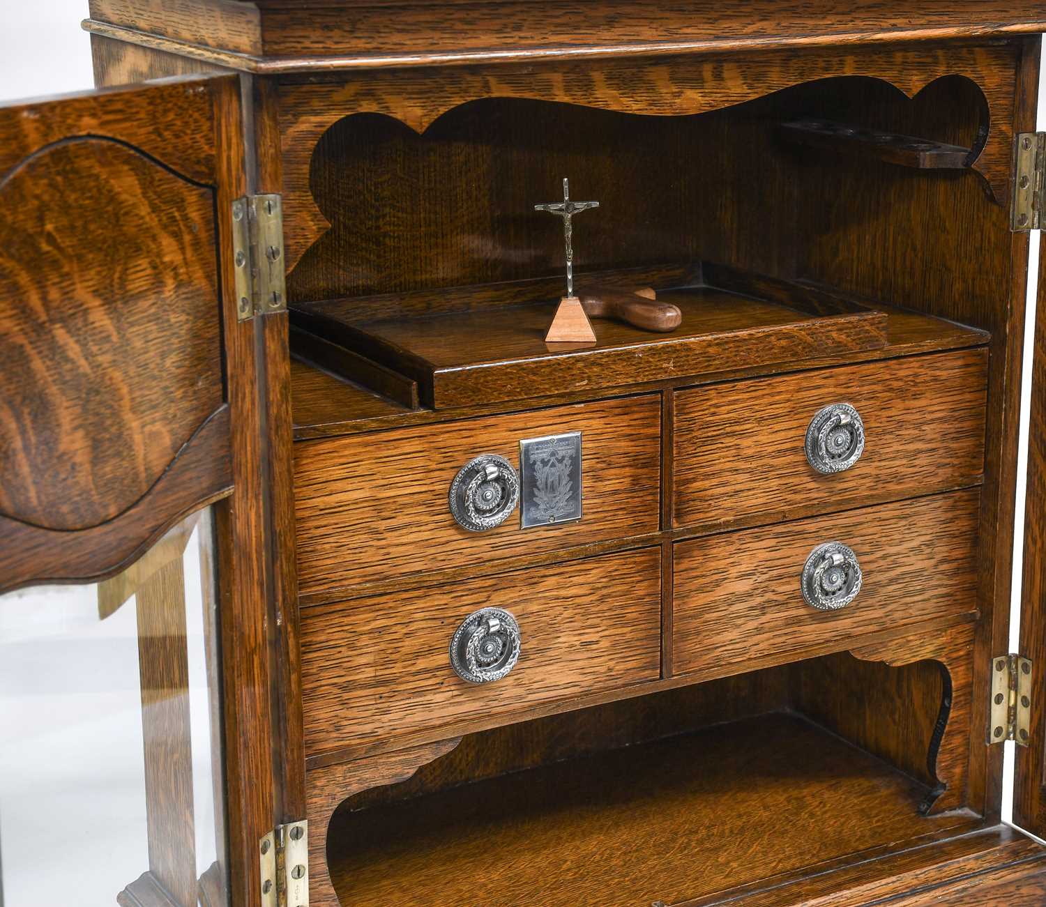 A Silver-Plate-Mounted Oak Smoker's Cabinet, the cavetto cornice over two glazed doors set with - Image 2 of 2