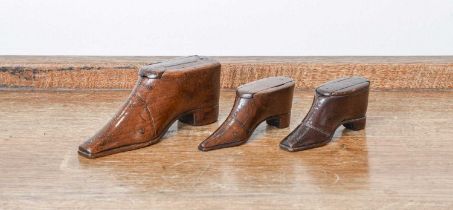 A Treen Vesta Box, early 19th century, formed as a boot, with striking surface to the sliding
