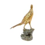 After Leon Bureau (1866-1906): A Gilt and Patinated Bronze Model of a Pheasant, on a