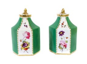 A Pair of Rockingham Porcelain Hexagonal Scent Bottles, circa 1830-42, painted with flower panels