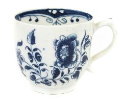 A Lowestoft Porcelain Coffee Cup, circa 1765-75, with scrolling handle and painted in underglaze