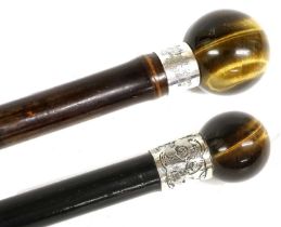 A Late Victorian Bamboo Walking Cane, with tiger's eye globular pommel and silver collar engraved