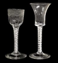 A Wine Glass, circa 1750, the flared bucket bowl on an opaque twist stem 15.5cm high A Similar