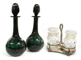 A Pair of Green Glass Mallet Decanters and Stoppers, early 19th century, of panelled form with