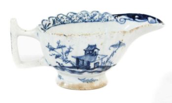 A Lowestoft Porcelain Fluted Butter Boat, circa 1765-75, with angular handle, painted in