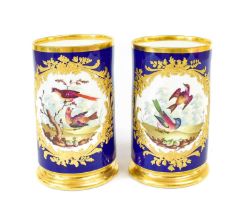 A pair of Bloor Derby Porcelain Spill Vases, circa 1830, of cylindrical form, ground in cobalt blue,