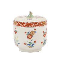A Bow Porcelain Sucrier and Cover, circa 1755, of circular form with flower finial, painted in