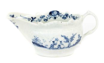A Lowestoft Porcelain Creamboat, circa 1775, painted in underglaze blue with the "Two Porter
