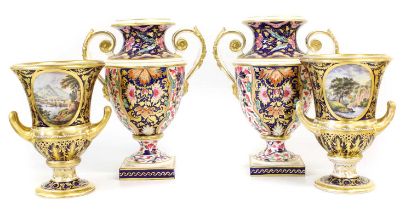A pair of Derby Porcelain Campana Vases, circa 1810, each ground in cobalt blue, gilded and with a