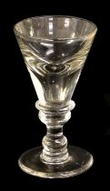A Toastmaster's Glass, circa 1740, the deceptive funnel bowl with basal annular knop, on double