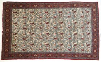 Ghom Carpet Central Iran, circa 1940 The ivory field with semi-naturalistic leafy vines and boteh