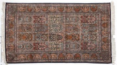 Kashmir Silk Rug, modern The compartmentalised field with rows of mihrabs containing stylised plants