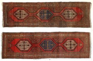 Pair of North West Persian Runners, circa 1930 Each with an abrashed strawberry field and three