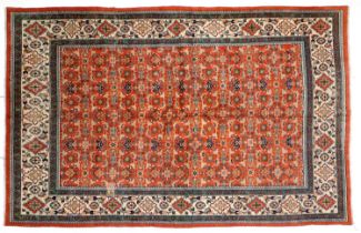 Mahal Carpet West Iran, circa 3rd quarter 20th century The terracotta herati field enclosed by ivory