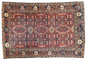 Mahal Carpet West Iran, circa 1930 The soft madder field with an allover lattice design of