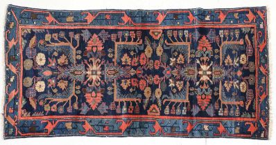 Hamadan Rug West Iran, circa 1940 The indigo field with central panel surrounded by stylised flowers