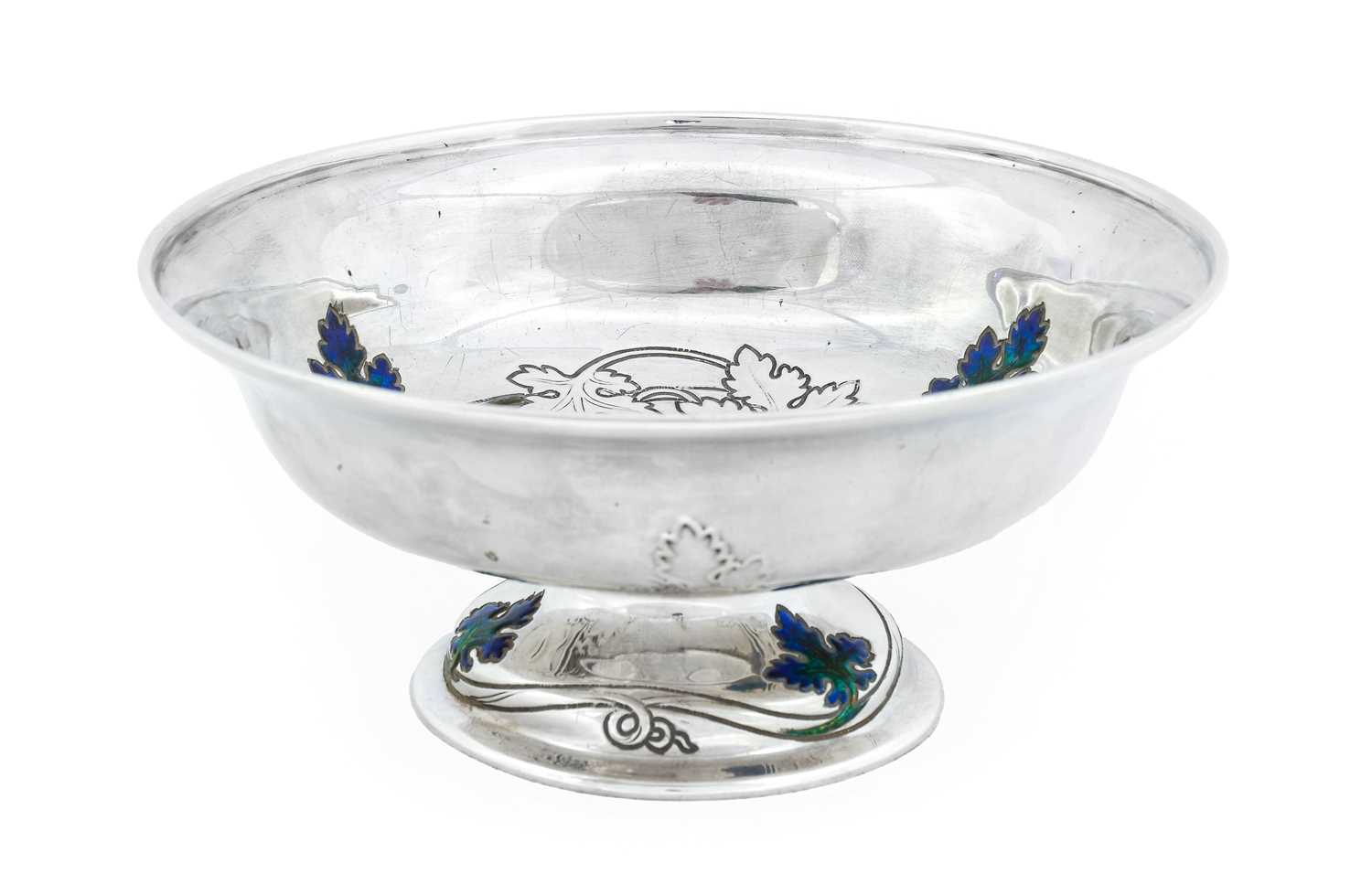 A Liberty & Co. Silver and Enamel Pedestal Bowl, cast with grape vines picked out in green and