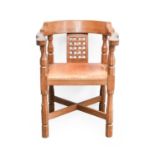 Workshop of Robert Mouseman Thompson (Kilburn): An English Oak Monk's Chair, with curved back and