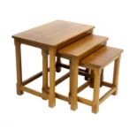 Yorkshire School: An English Oak Nest of Three Tables, flat rectangular tops, on four octagonal legs