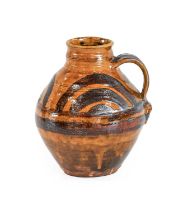 Leach Pottery (St Ives): An Earthenware Jug, circa 1930, rich toffee-brown glaze with iron-painted