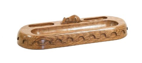 Workshop of Robert Mouseman Thompson (Kilburn): An English Oak Pen Tray, oblong with penny moulding,