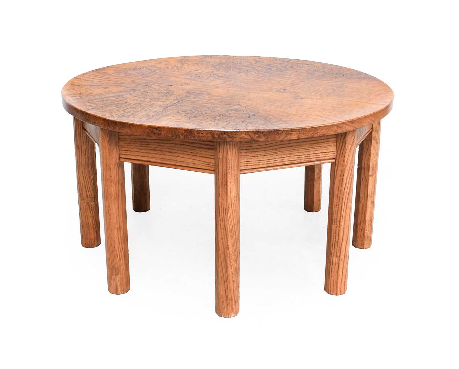 An English Burr Oak Coffee Table, the circular top on eight octagonal legs, unmarked, 82.5cm