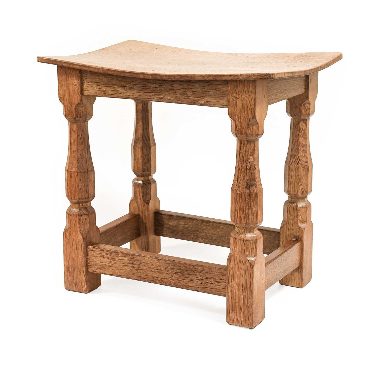 Workshop of Robert Mouseman Thompson (Kilburn): An English Oak Dish Top Stool, the rectangular