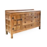 Robert Mouseman Thompson (1876-1955): An English Oak 5'3" Panelled Sideboard, 1930s, with raised