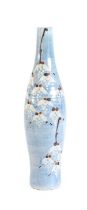 Tim Andrews (b. 1960): A Porcelain Vase, wax resist and iron oxide decorated with blossom, on a blue