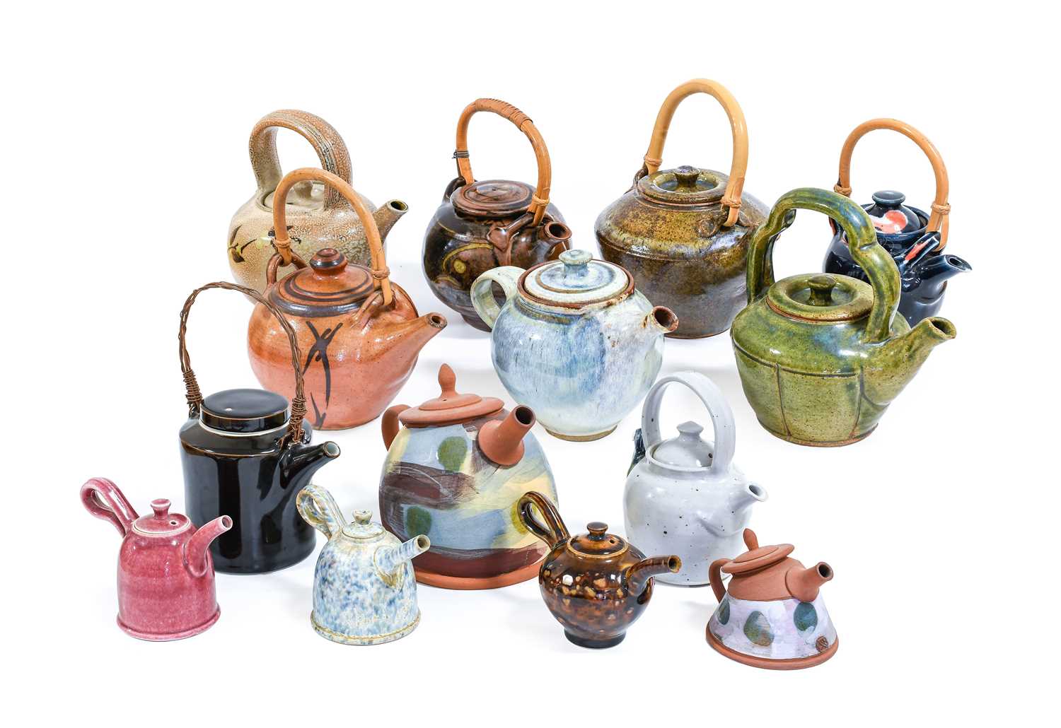 Isabel Jane Denyer (b.1947): A Stoneware Teapot and Cover, oatmeal glaze, modelled bird, impressed
