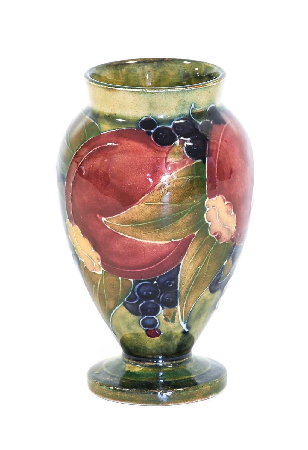 William Moorcroft (1872-1945): A Pomegranate Pattern Vase, 1914, tubeline decorated in shades of