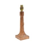 Workshop of Robert Mouseman Thompson (Kilburn): An English Oak Table Lamp, octagonal column on a