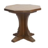 Robert Mouseman Thompson (1876-1955): An English Oak Octagonal Coffee Table, adzed top, on a