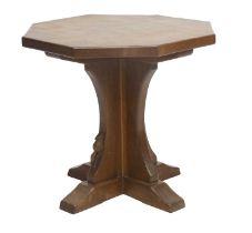 Robert Mouseman Thompson (1876-1955): An English Oak Octagonal Coffee Table, adzed top, on a