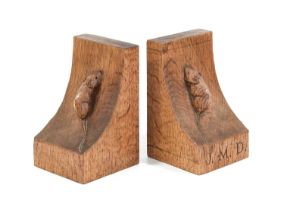 Workshop of Robert Mouseman Thompson (Kilburn): A Pair of English Oak Single Mouse Bookends, one