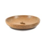 Workshop of Robert Mouseman Thompson (Kilburn): An English Oak Fruit Bowl, with carved mouse