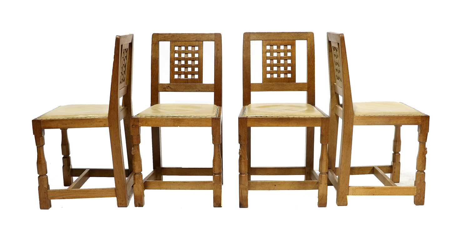 Workshop of Robert Mouseman Thompson (Kilburn): A Set of Four English Oak Lattice Back Dining