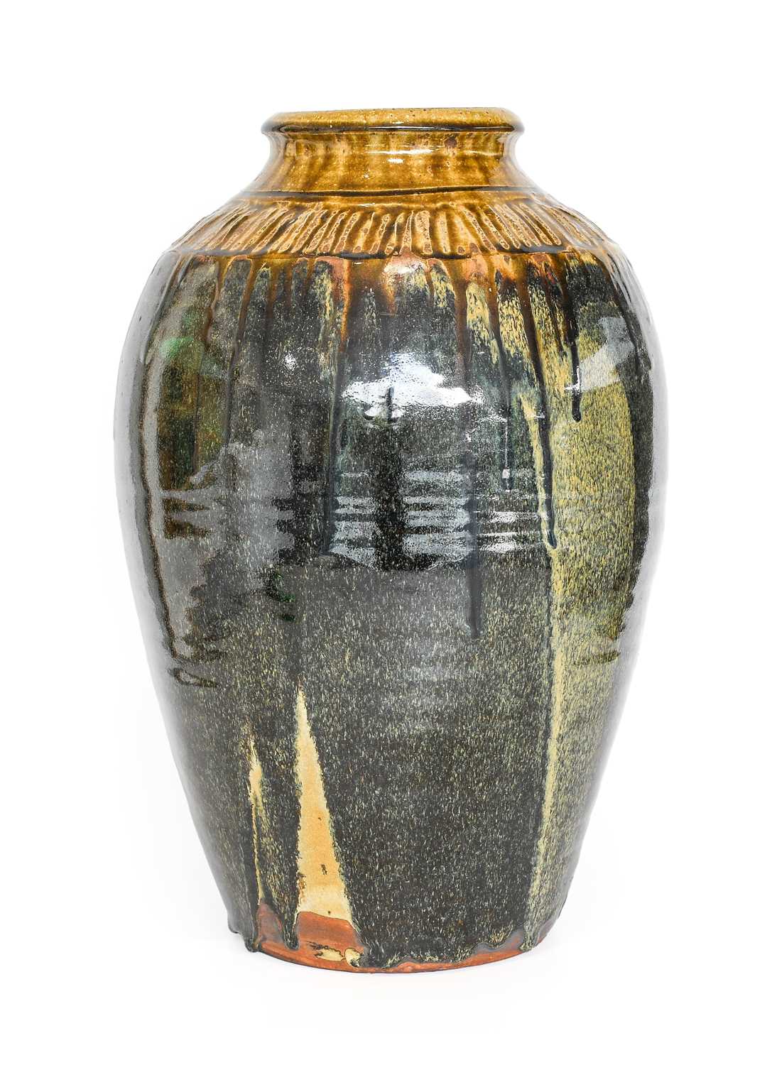 Mike Dodd (b. 1943): A Stoneware Vase, covered in a green ash and tenmoku glaze, unmarked, 39.5cm