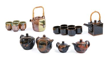 Derek Emms (1929-2004): A Stoneware Teapot and Cover, covered in tenmoku and kaki glaze, impressed