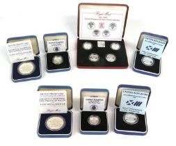 Assorted Royal Mint Silver Proof Coins, 7 coins across 4 boxes, to include; UK £1 silver proof