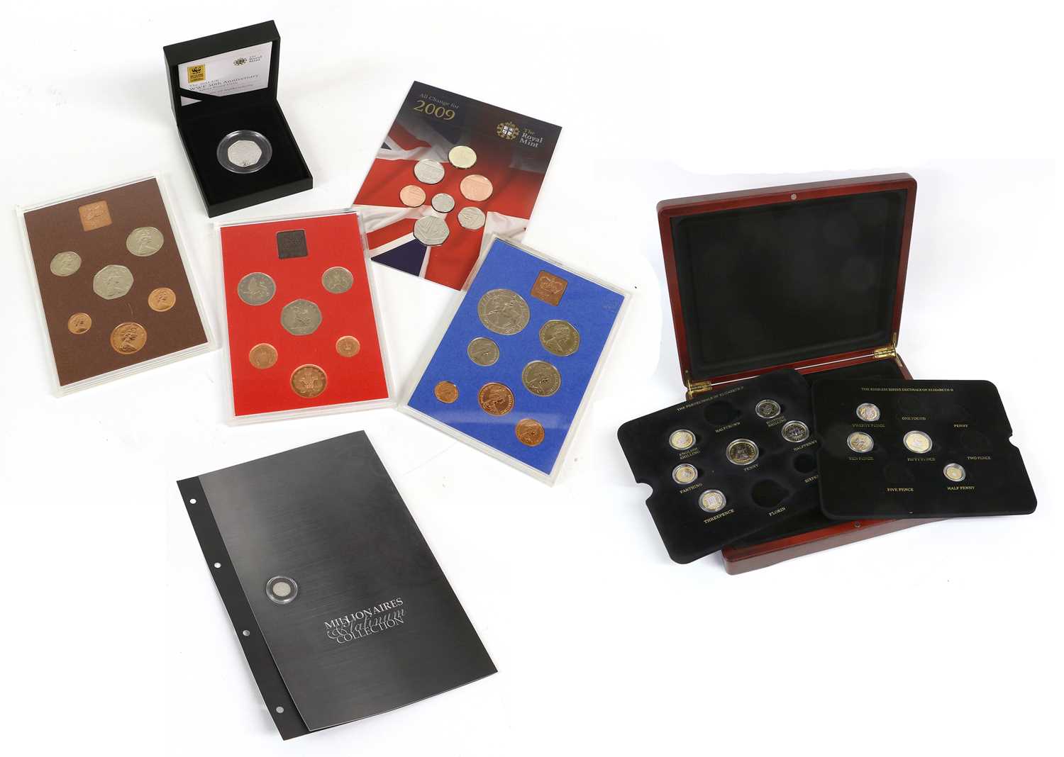 Mixed Platinum and Silver Coins and Proof Sets, comprising; fine silver Britannia 2010,
